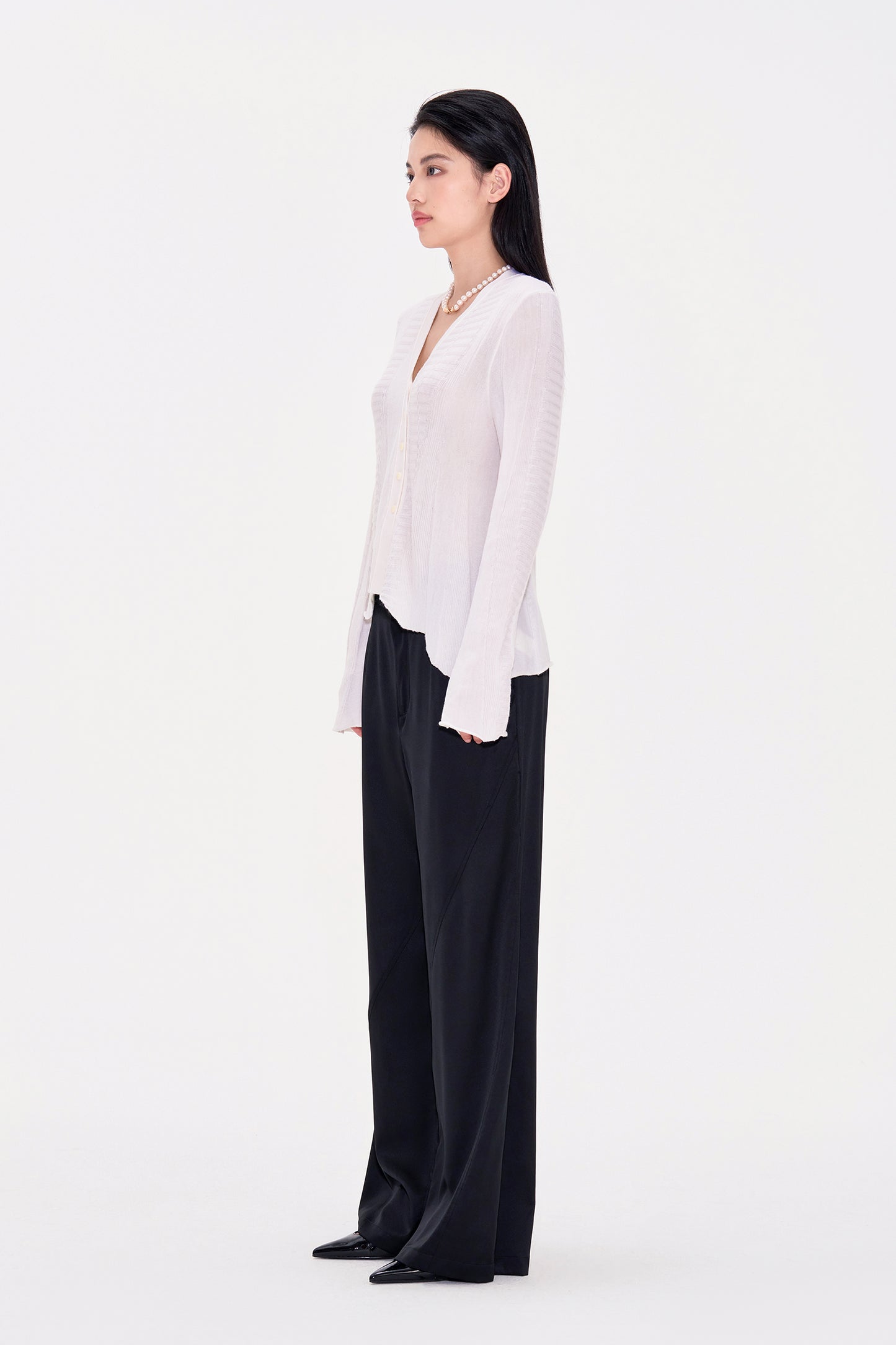Irregularly Buttoned Wool Long sleeved Cardigan