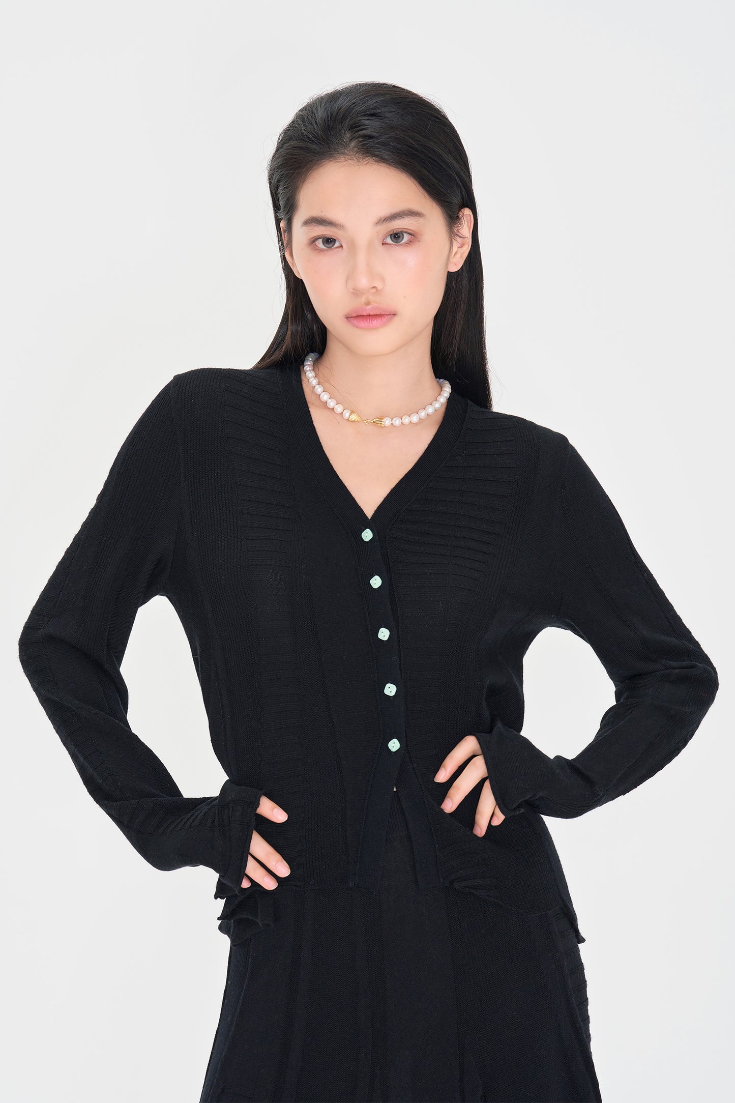 Irregularly Buttoned Wool Long sleeved Cardigan
